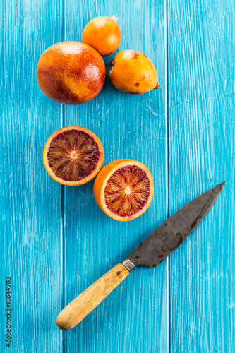Close-up of tangerines with knife