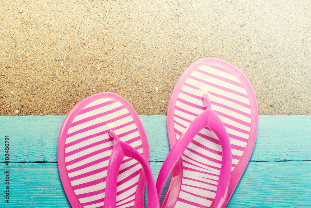 Fototapeta premium Summer concept with sandy beach, shells and cord.