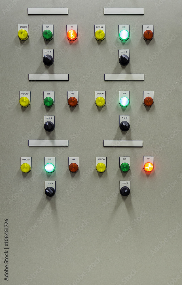 Group of status indicator light and selective switch of Auto-Manual on electrical control panel with blank name tag. Group of status indicator light and selective switch of Auto-Manual on electrical control panel with blank name tag.