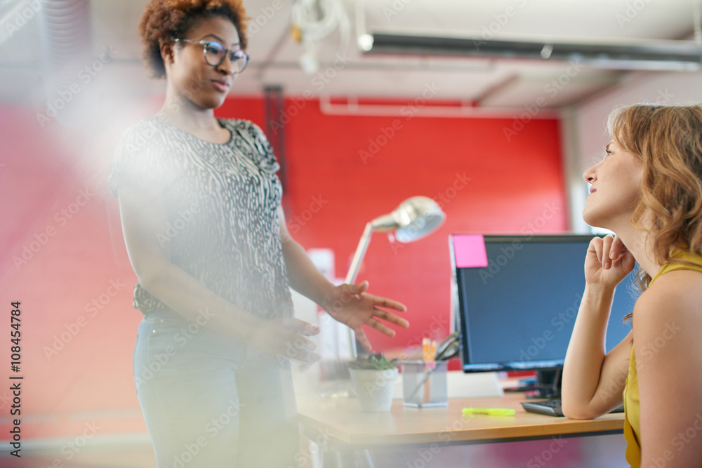 unposed-group-of-creative-business-people-in-an-open-concept-office