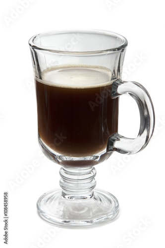 Glass of your favorite hot beverage - coffee, tea, mulled wine. On a white background, glassware, side view. A cup of black coffee for breakfast, strong espresso