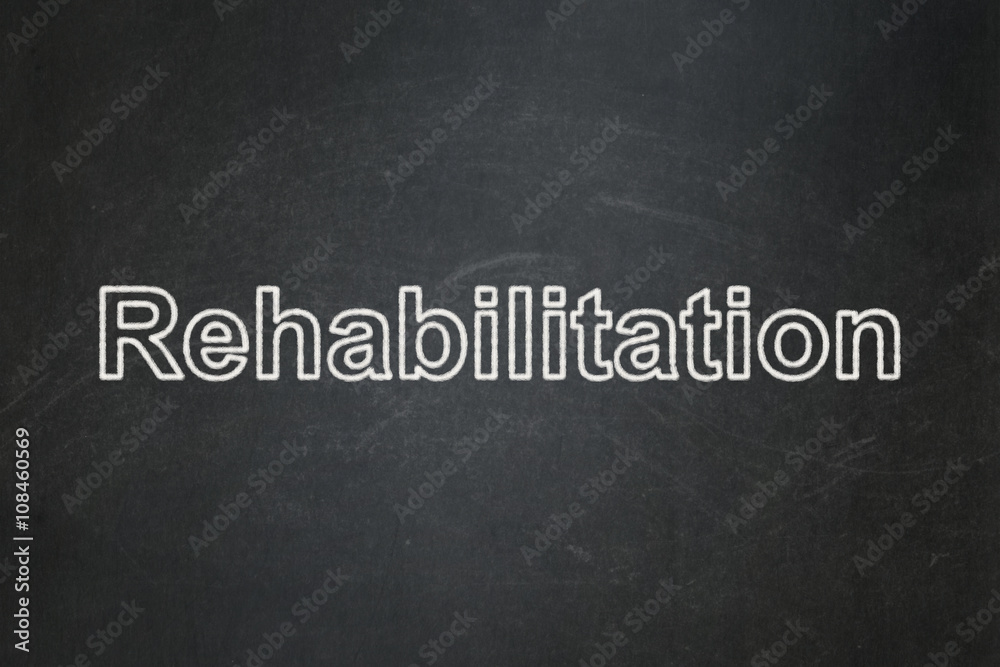 Obraz premium Medicine concept: Rehabilitation on chalkboard background