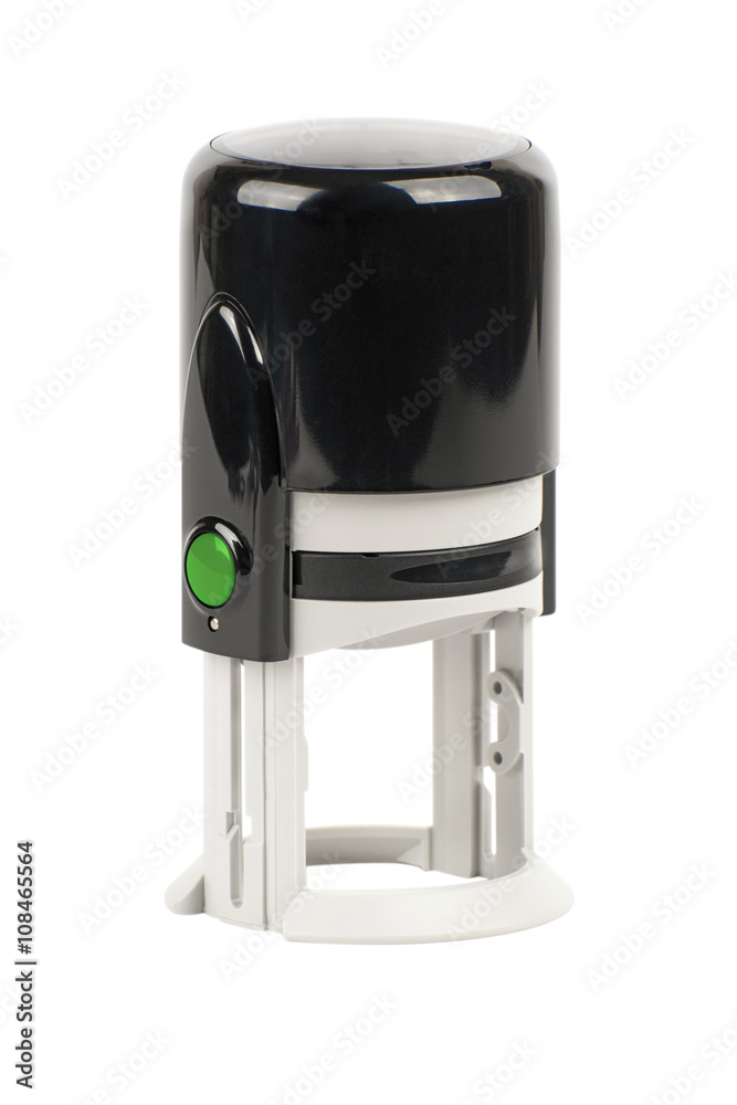 Hand round automatic stamp, black with a green button.