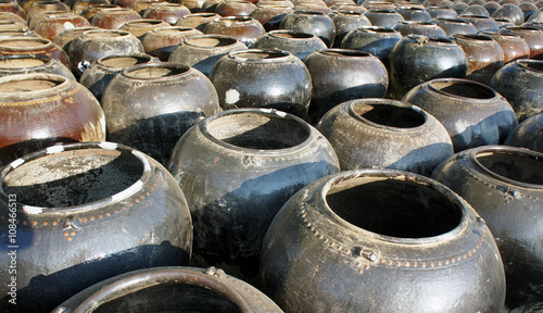 large clay pots standing in rows in Myanmar