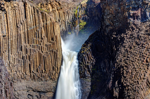 The Litlanesfoss waterfall in Iceland with its basaltic columns