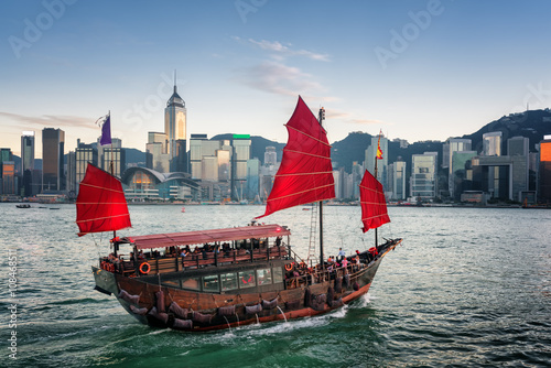 Tourists on wooden sailing ship crosses Victoria harbor