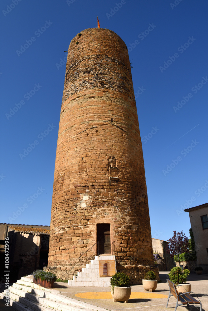 Church anf Medieval tower of village of Cruilles, Baix Emporda,