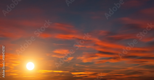 Fototapeta Naklejka Na Ścianę i Meble -  dramatic sunset background with orange clouds