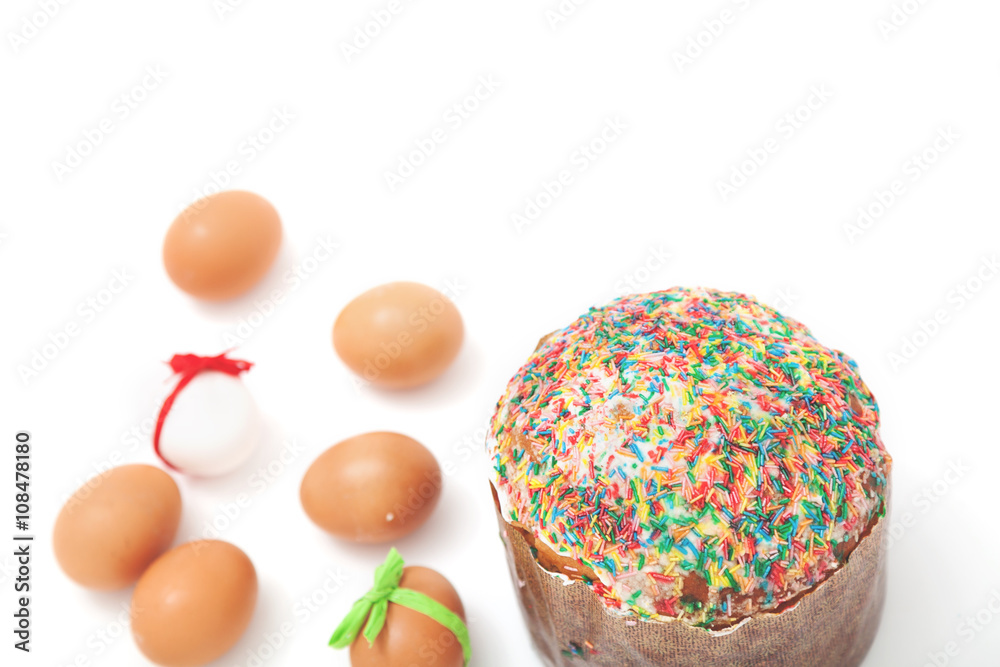 Easter cake and Easter eggs on white background