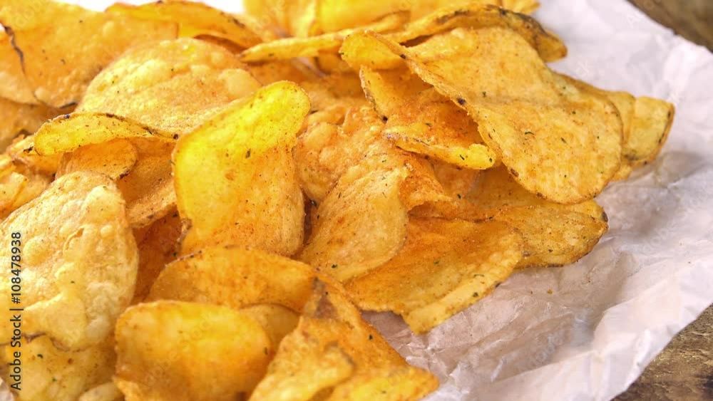 Portion of crispy Potato Chips (4K, seamless loopable) Portion of crispy Potato Chips (4K, seamless loopable)