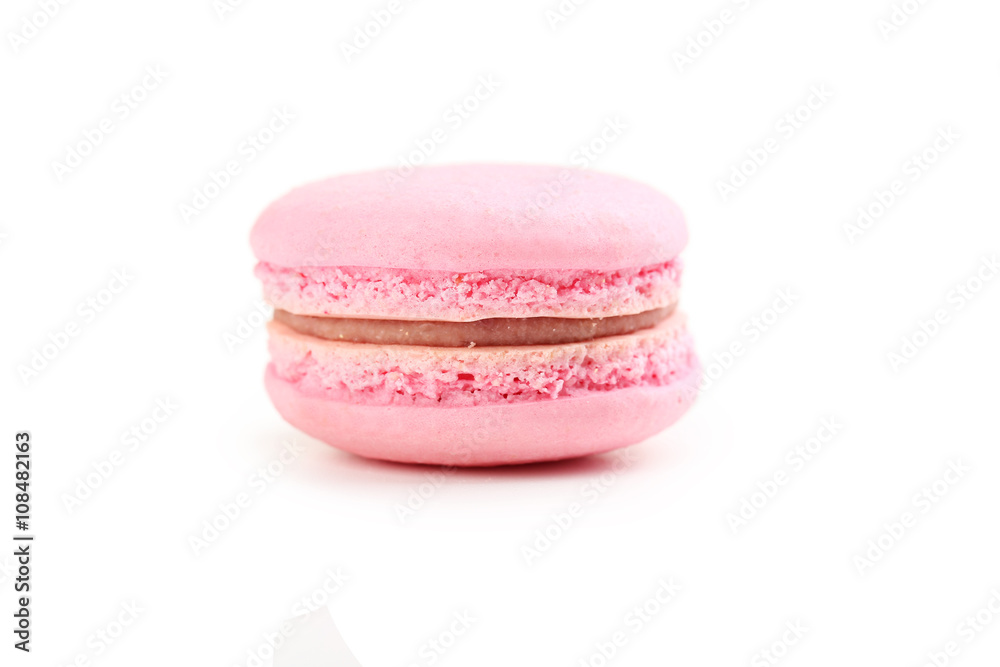 Tasty pink macaron isolated on white Tasty pink macaron isolated on white