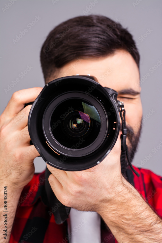 Close up photo of man's hands holding digital camera Close up photo of man's hands holding digital camera