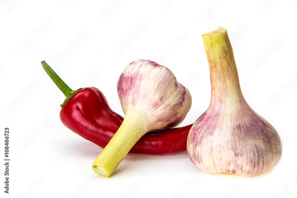 Fototapeta premium pepper paprika onion and garlic on a white background