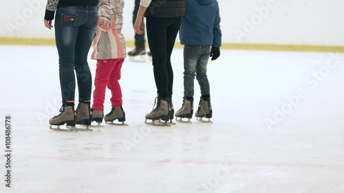 People skating at rink. Slow motion