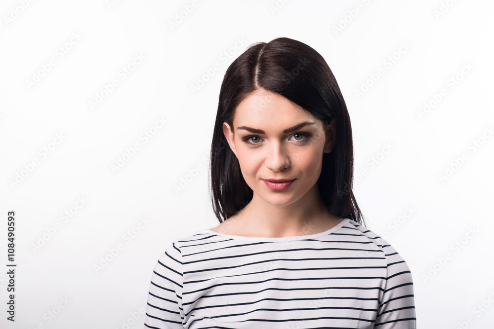 Pleasant beautiful girl standing on white background Pleasant beautiful girl standing on white background