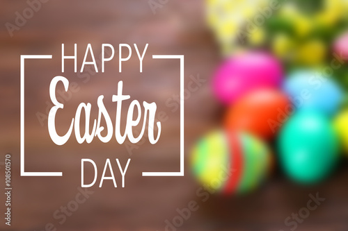 Easter greeting text on blurred festive background photo