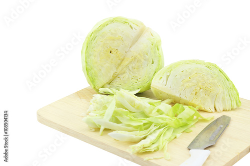 Cabbage on a wooden chopping block