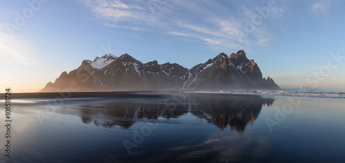 Stocknes moutines in a water reflection Iceland