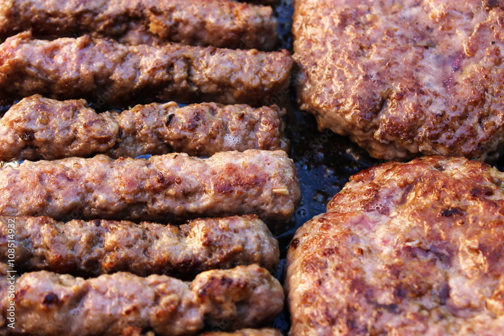 Hamburger and Meatball on the grill Hamburger and Meatball on the grill