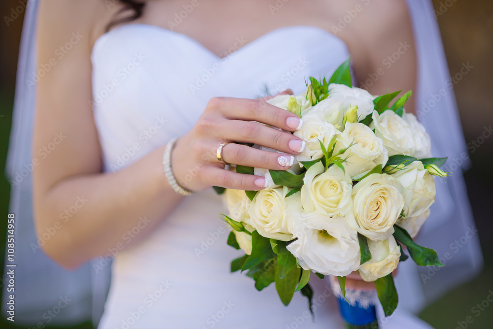 bride holds fresh white bouquet closeup outdoor bride holds fresh white bouquet closeup outdoor