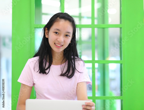beautiful asian woman using laptop computer.