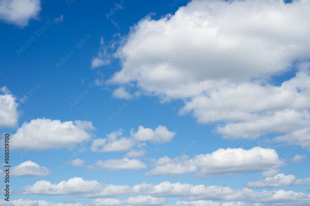 Fototapeta premium White heap clouds in the blue sky. Heaven.