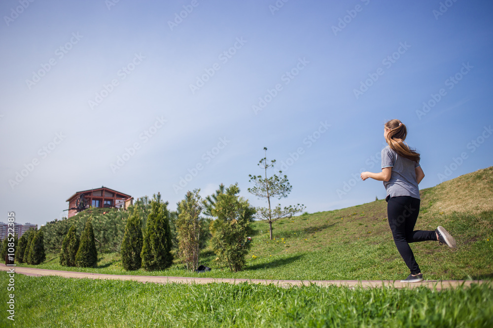 Photo of young blonde woman doing running activities Photo of young blonde woman doing running activities