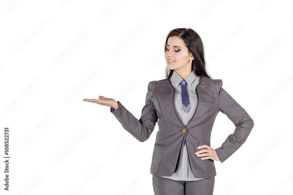 Young woman holding something imaginary on palm of her hand isolated on white background Young woman holding something imaginary on palm of her hand isolated on white background