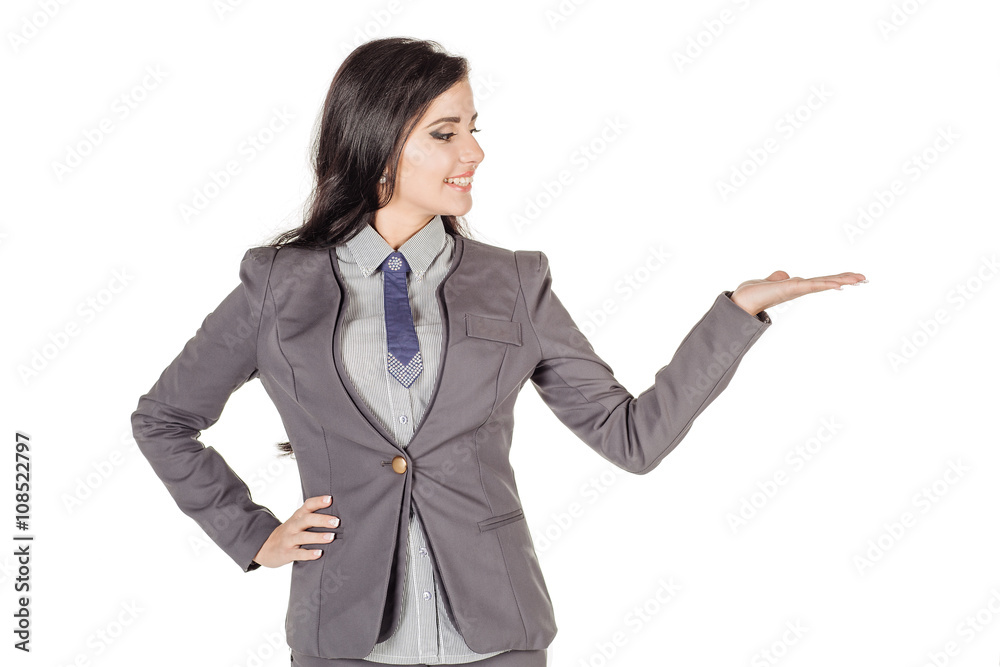 Young woman holding something imaginary on palm of her hand isolated on white background Young woman holding something imaginary on palm of her hand isolated on white background