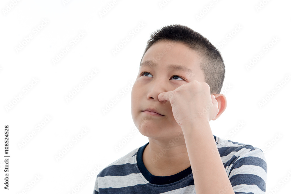 Asian boy Picking a booger on white background. Asian boy Picking a booger on white background.