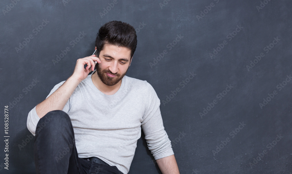 Casually handsome. Portrait of joyful young Arabic man standing