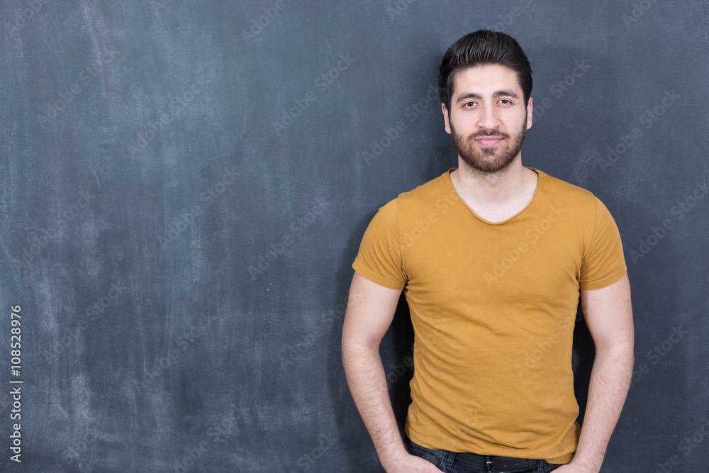man draws on a chalkboard - copy space man draws on a chalkboard - copy space