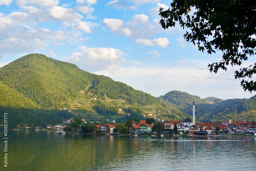 Muslim village on the river Drina before the mountain