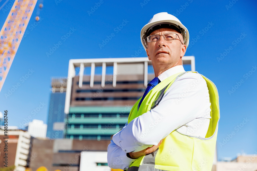 Engineer builder at construction site Engineer builder at construction site