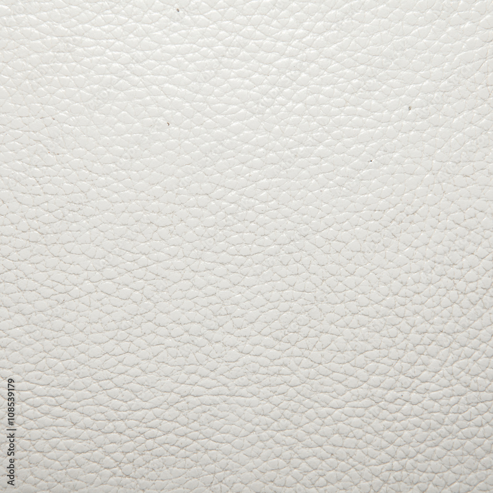 white leather background in the folds white leather background in the folds