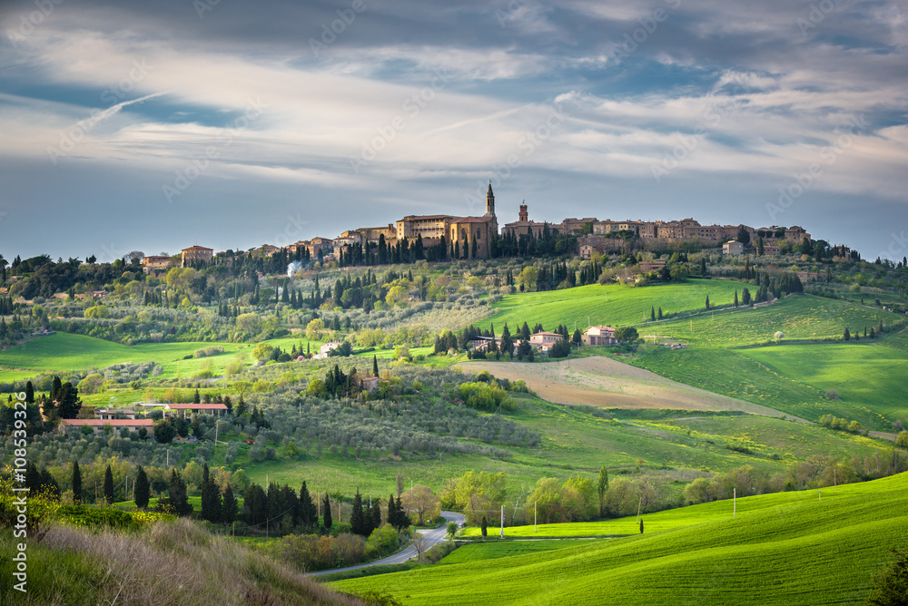 Spring landscape of Tuscany overlooking the medieval town of Pie
