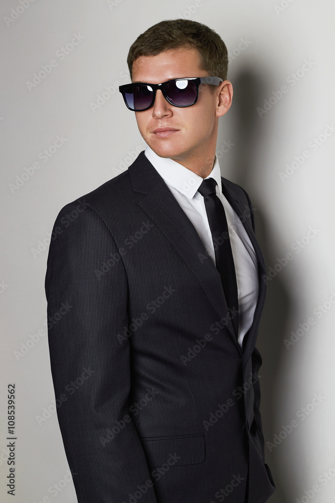 handsome Man in suit.young businessman in sunglasses handsome Man in suit.young businessman in sunglasses
