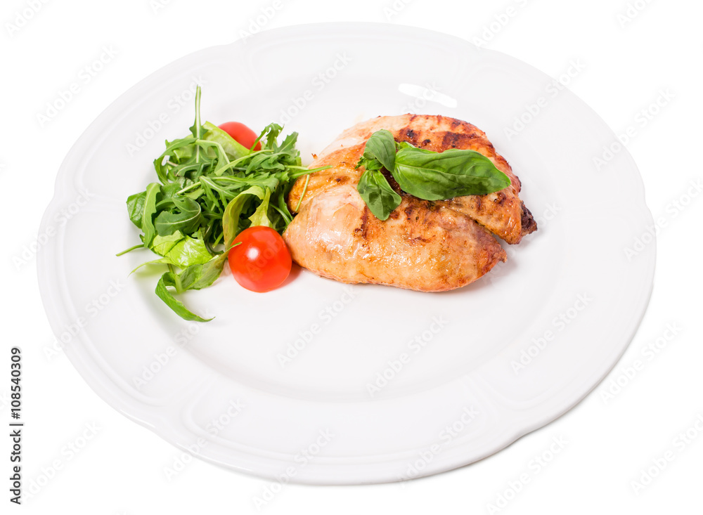 Grilled chicken fillet with tomatoes cherry.
