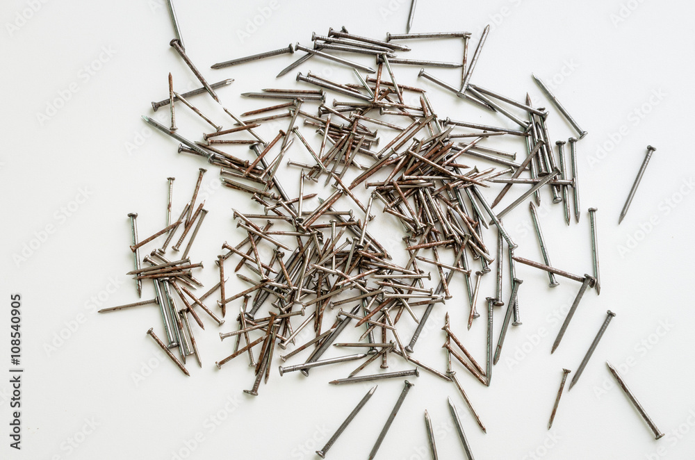 pile of iron nail on white background