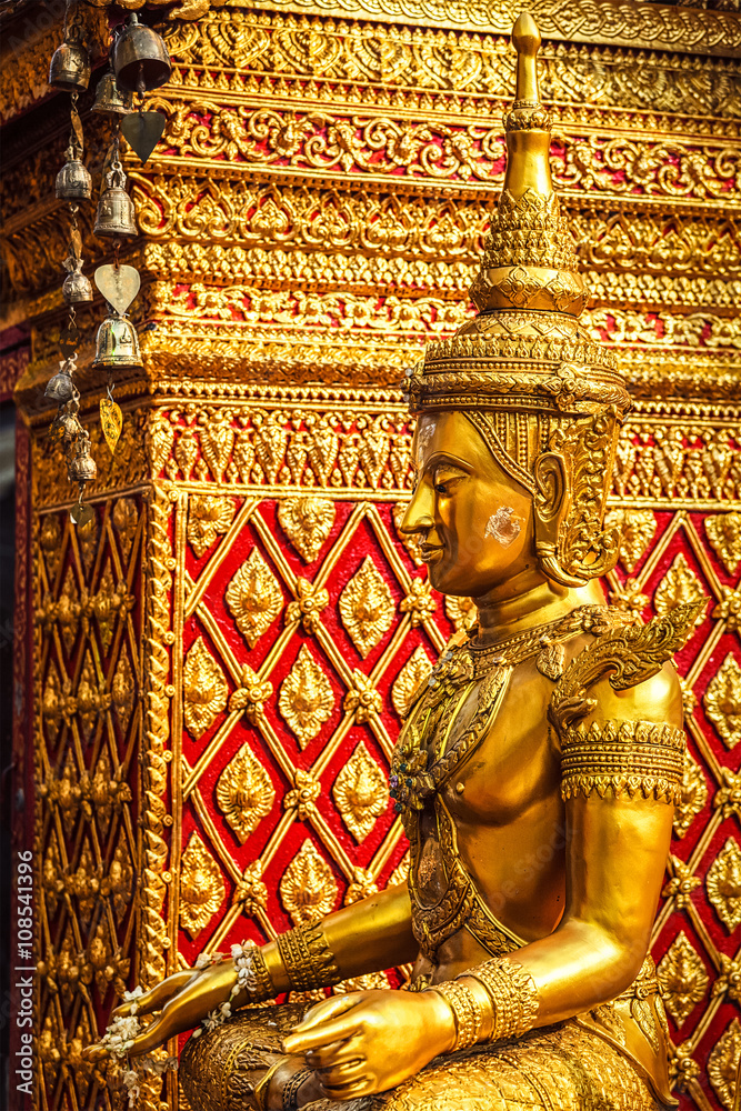 Gold sitting Buddha statue in Thailand