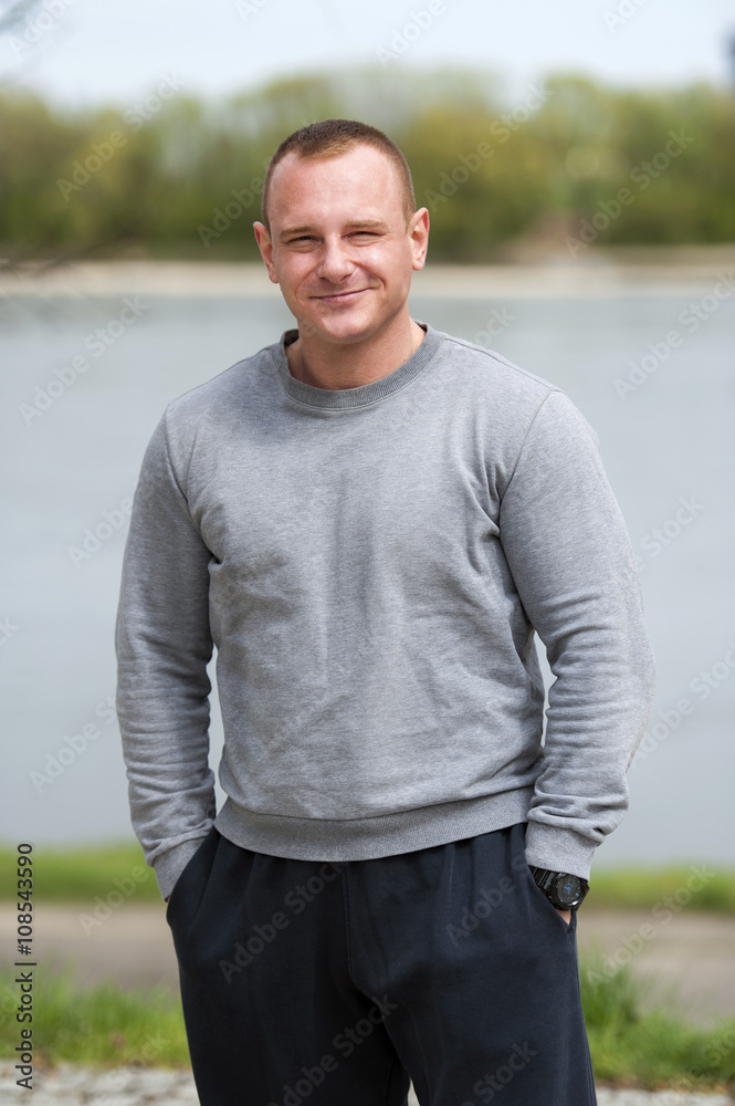 Active man with athletic body, exercise outdoore in park. Fit lo Active man with athletic body, exercise outdoore in park. Fit lo