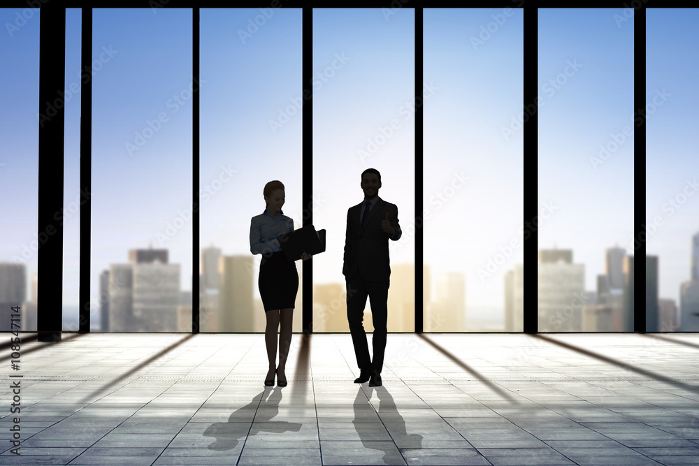 Fototapeta premium silhouettes of business partners with folders