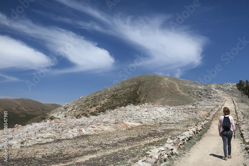 Figure walking on Islas del Sol on Lake Titicaca, Bolivia, South America