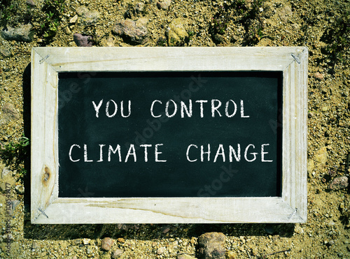 chalkboard with the text you control climate change