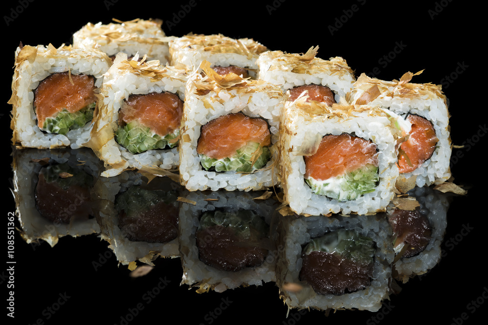 Selective focus point on Salmon sushi roll, traditional japanese Selective focus point on Salmon sushi roll, traditional japanese