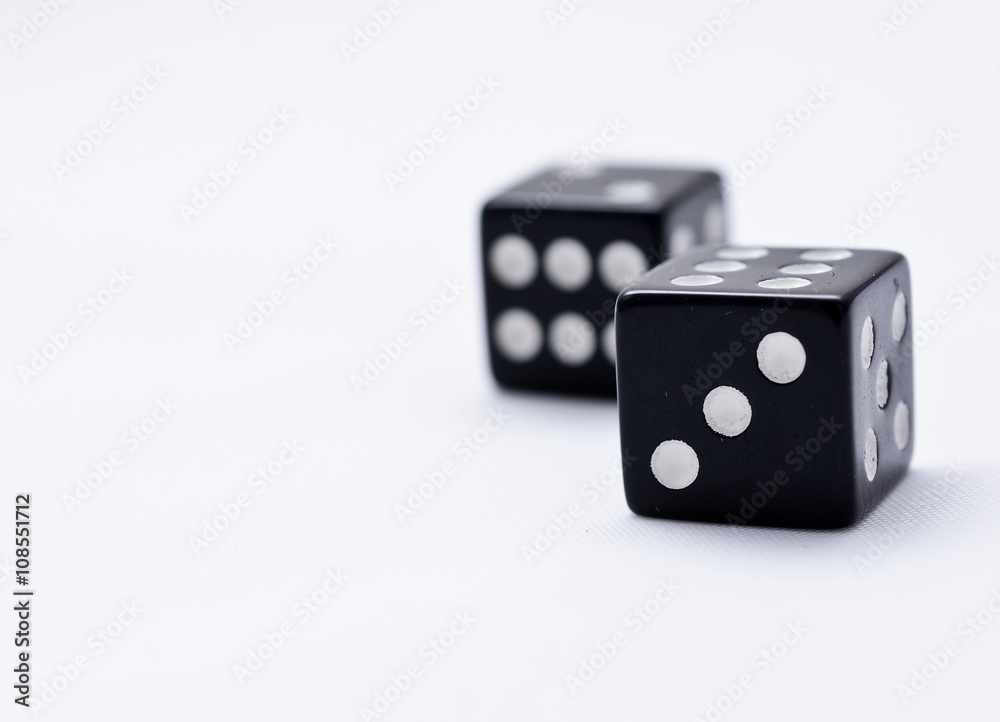 two black dice on a white background two black dice on a white background