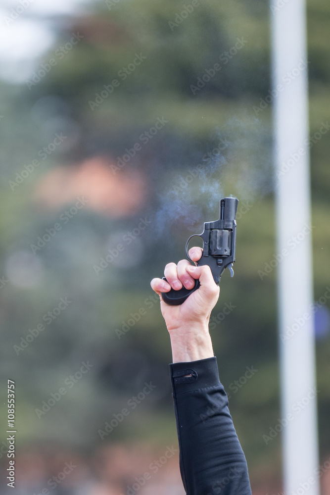 athletics gun firing in the air