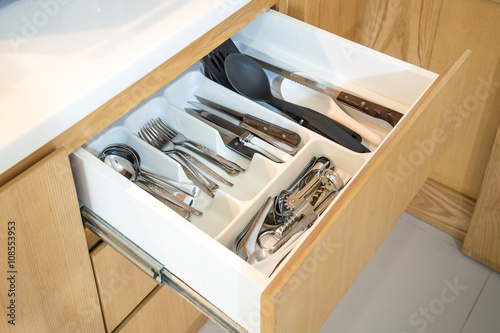 Canvas Print Open kitchen drawer with cutlery