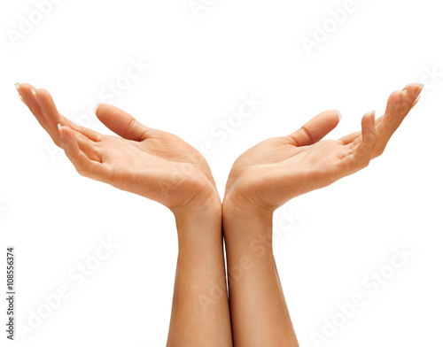 Fotografija Two woman's hands protecting something, empty hands isolated on white background