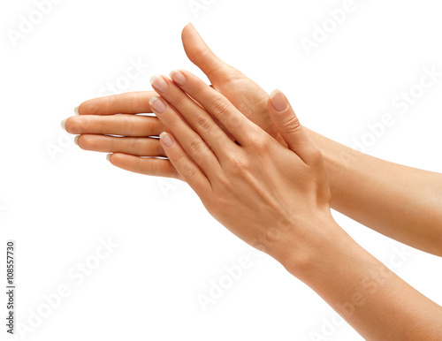 Fototapeta Clapping! Women's hands going to applause isolated on white background